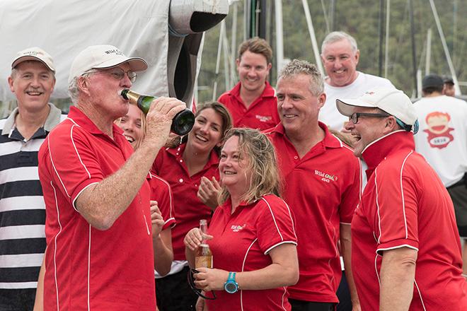 Wild Rose IRC div C winners Roger Hickman drinking champagne - 2015 Audi Hamilton Island Race Week © Andrea Francolini